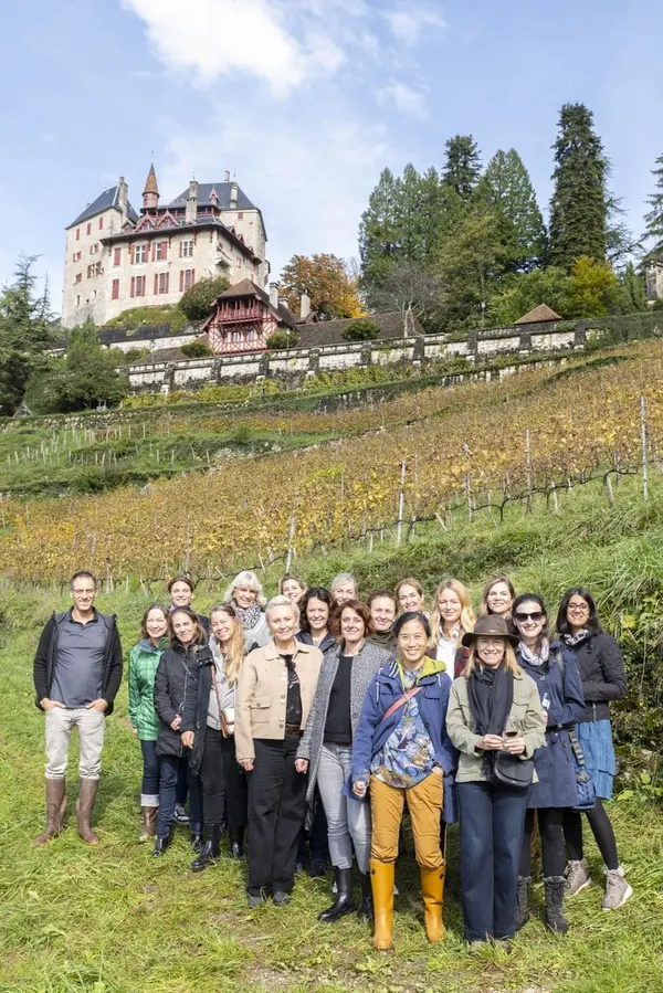 VinoVoyages guests in the Savoie vineyards below Château de Menthon-Saint-Bernard, near Annecy